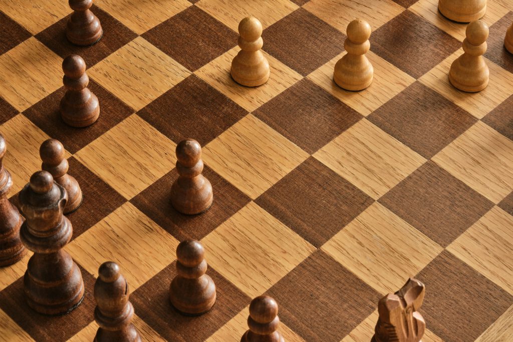 wooden chess board with wooden chess pieces